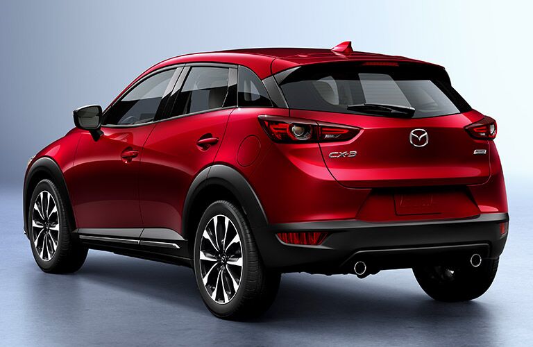 Red 2019 Mazda CX-3 Rear Exterior on Gray Background