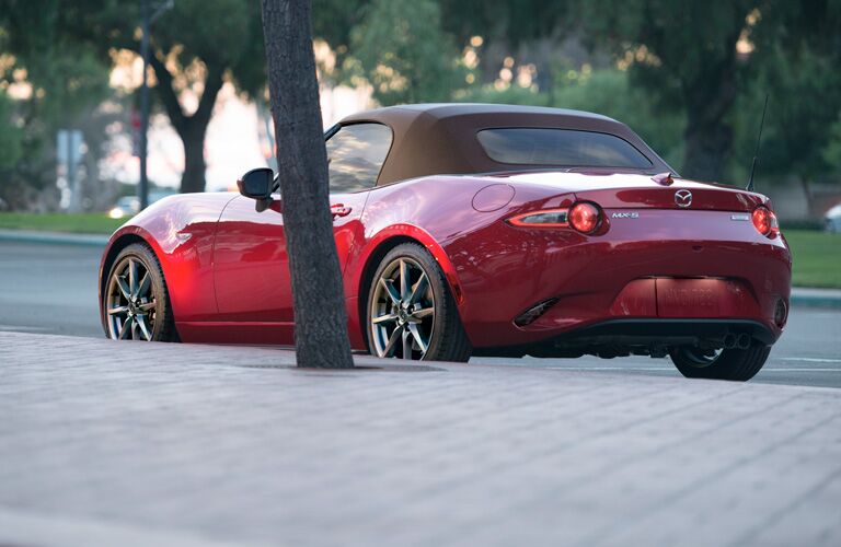 Red 2019 Mazda MX-5 Miata Rear Exterior with a Brown Convertible Top