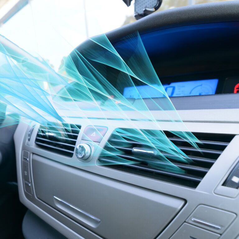 car vents with blue stylized air