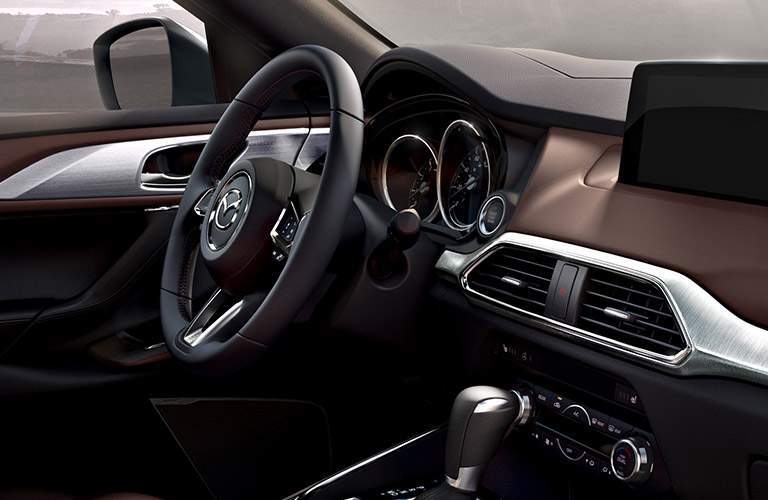 2018 Mazda CX-9 dashboard, transmission, and steering wheel