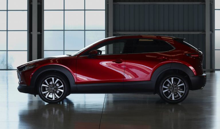 2020 Mazda CX-30 exterior side shot parked in a dark garage hangar