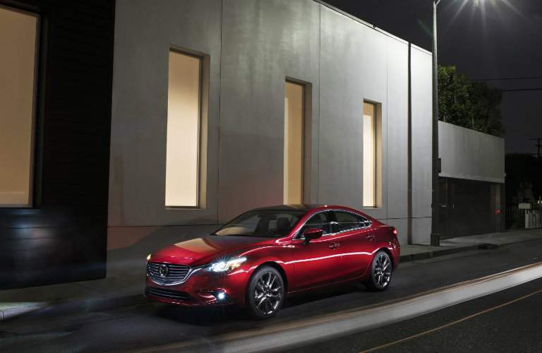 red mazda6 driving at night