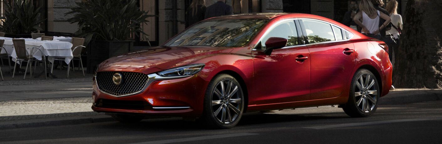 red mazda6 parked by restaurant