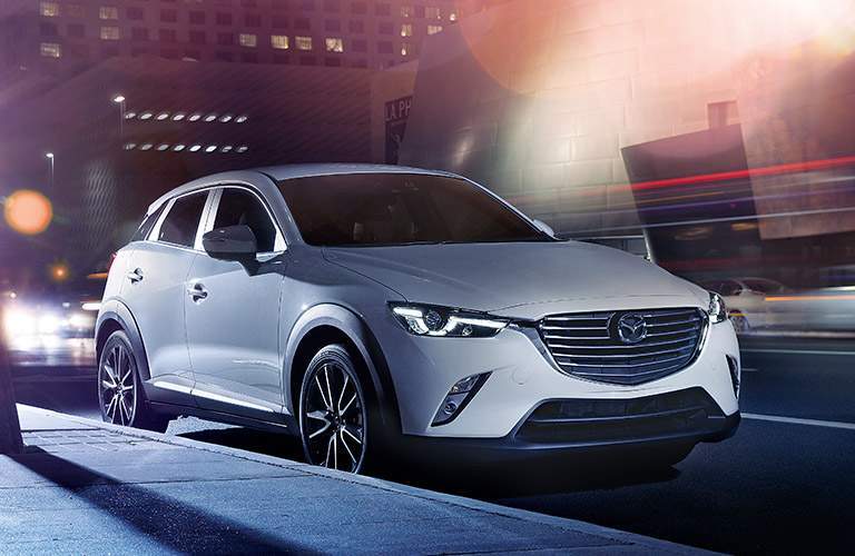 white mazda cx-3 parked