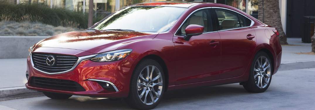 red 2017 mazda mazda6 parked on city street