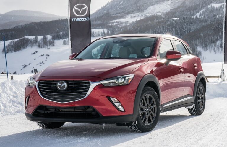 2018 Mazda CX-3 red front view in snow with AWD