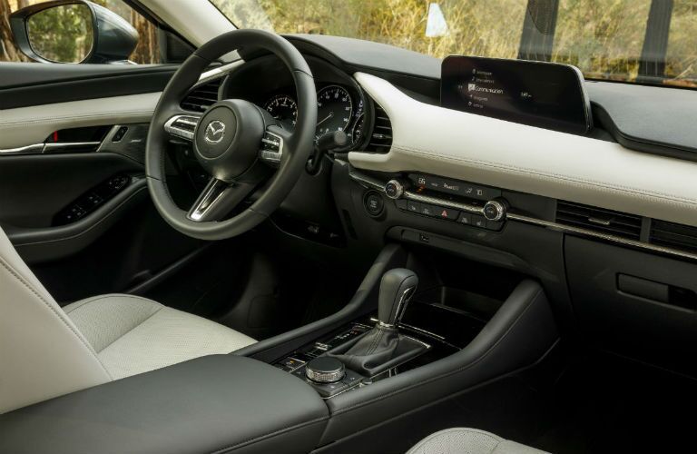 2019 Mazda3 tan leather interior front seat and dash