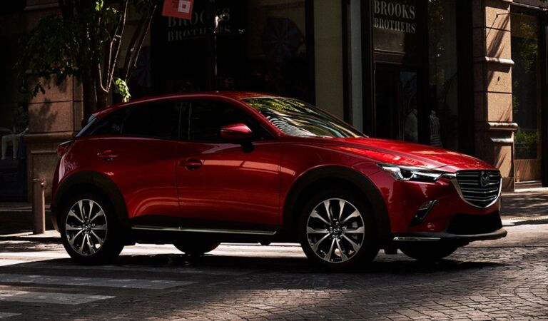 2019 Mazda CX-3 red side view on cobblestone