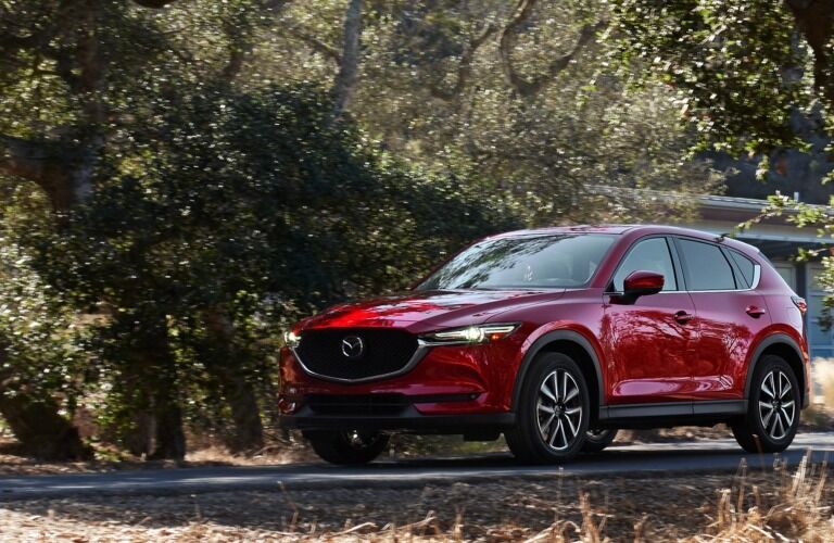 2019 Mazda CX-5 red side view on a country road