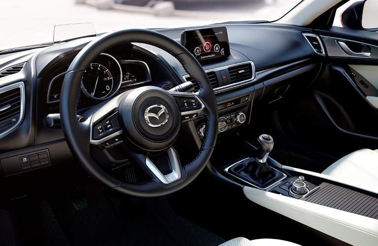 Steering wheel and dashboard of the 2018 Mazda3