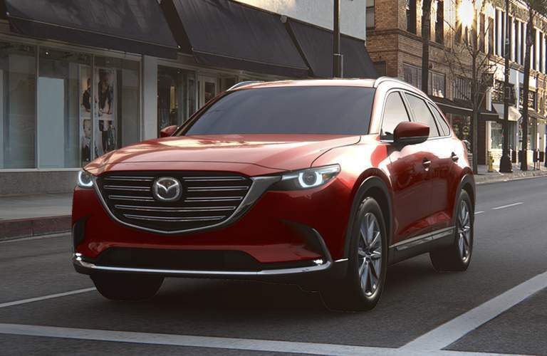 red mazda cx-9 in city