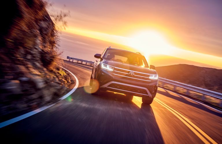 2021 VW Atlas with the sun setting behind it