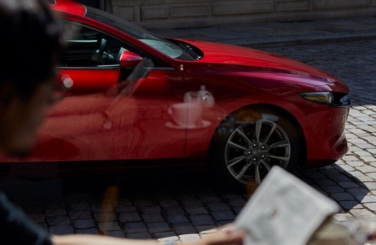 2020 Mazda3 Hatchback viewed through cafe window