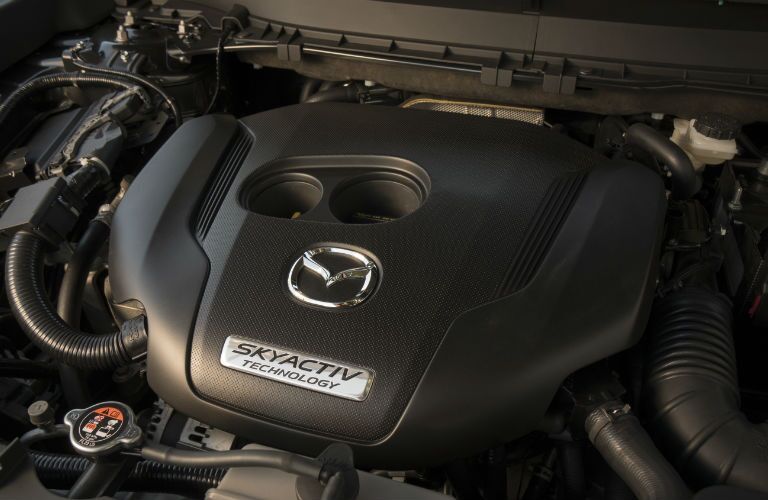 A photo of the engine used in the 2019 Mazda CX-5 Grand Touring.