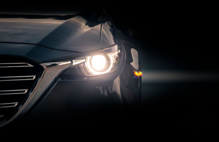 A photo of the automatic headlights on the 2019 Mazda CX-9 Touring.
