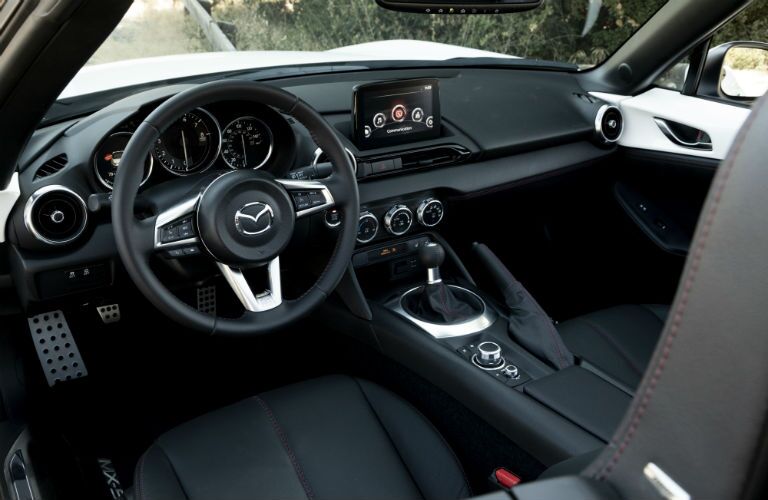 A photo of the driver's cockpit in the 2019 Mazda MX-5 Miata.