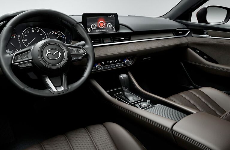 front seats, steering wheel, dash of mazda6