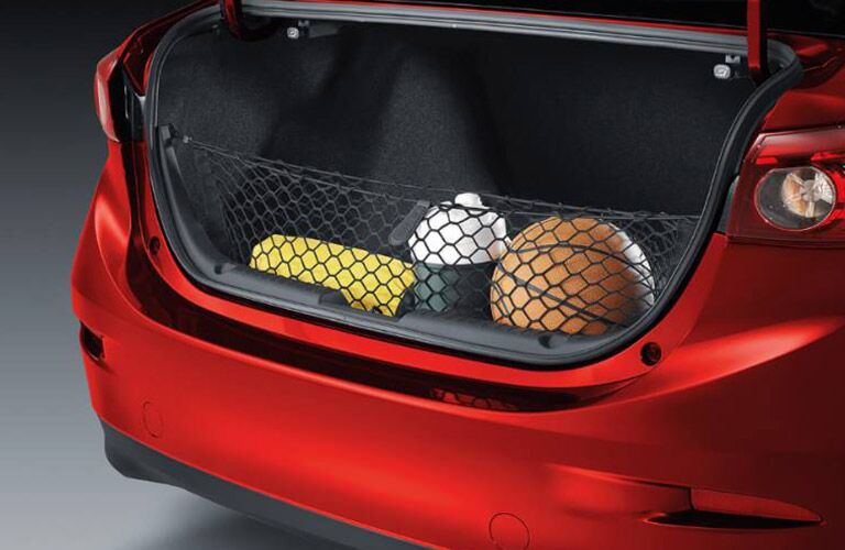 2018 Mazda3 4-Door Trunk Open with Various Supplies