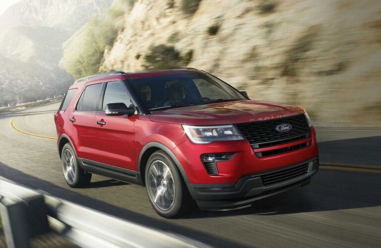2018 Ford Explorer driving along a cliff
