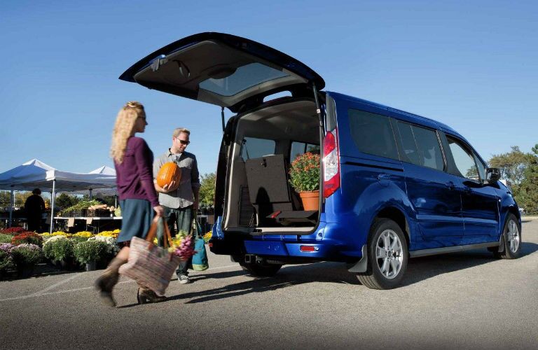 2018 Ford Transit Connect with people loading flowers