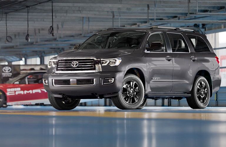 2018 Toyota Sequoia in grey parked in a service center