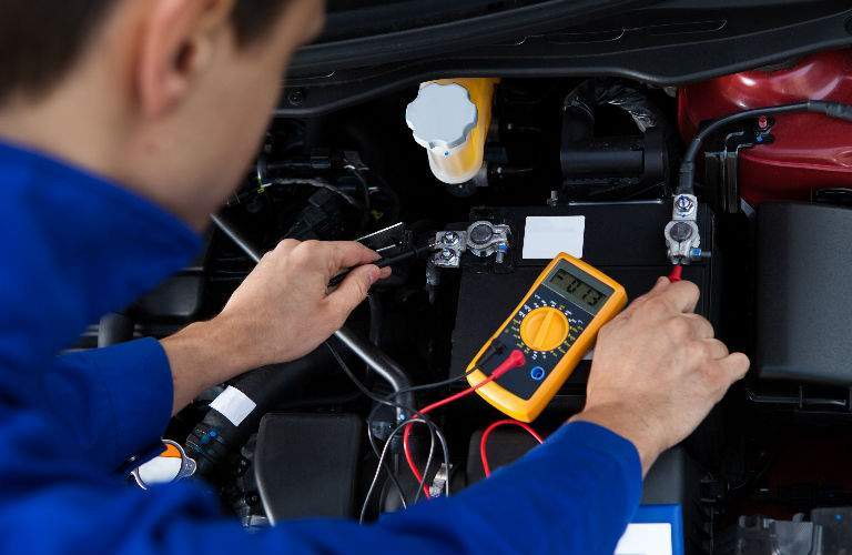 Service Tech Working on Battery