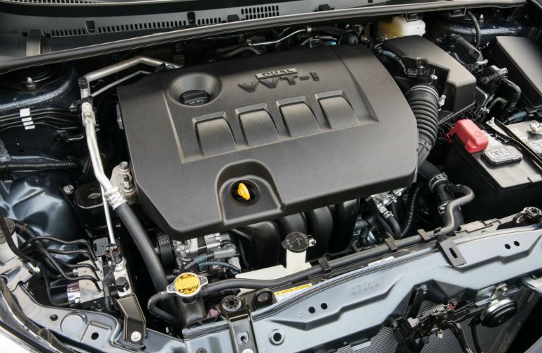A photo of an engine used by a certified pre-owned Toyota Corolla.