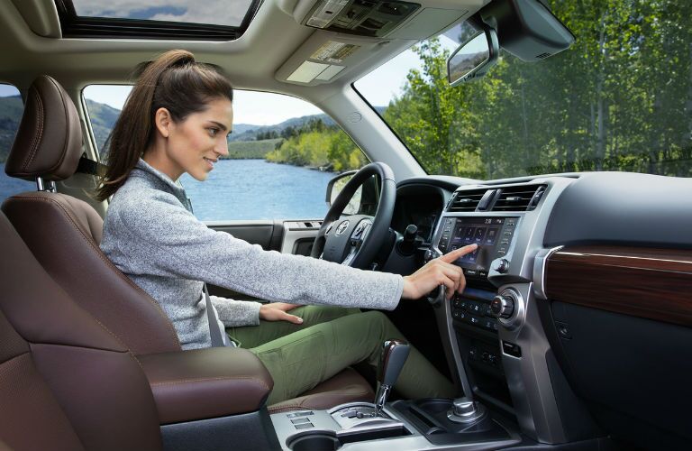 A photo of a person using the technology in the 2020 Toyota 4Runner.