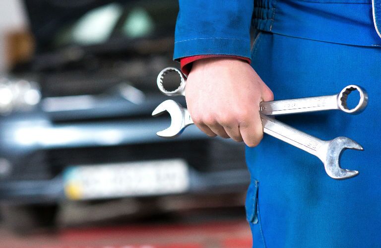 Service Professional Holding Tools in Hand