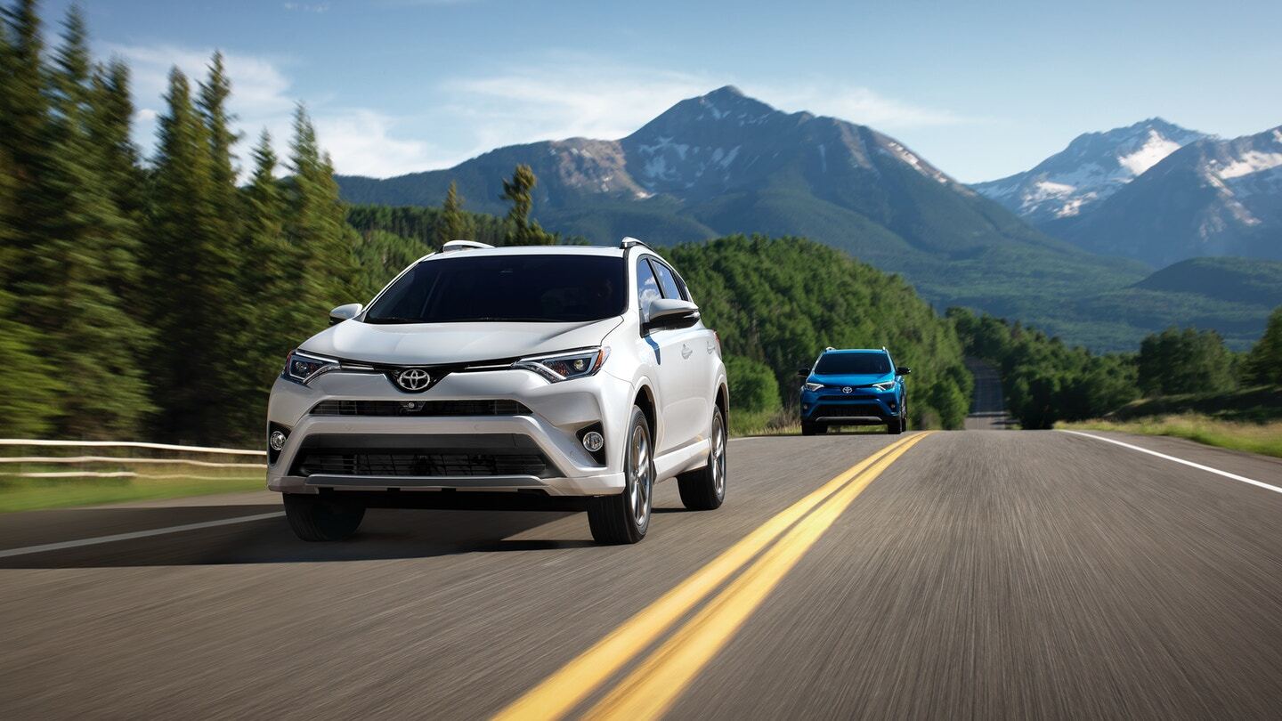 Front exterior view of a white Toyota Rav4