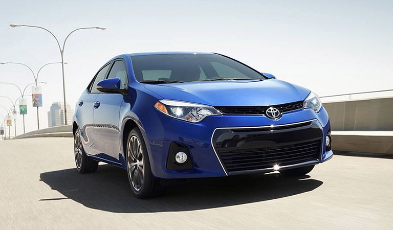 Front exterior view of a blue Toyota Corolla