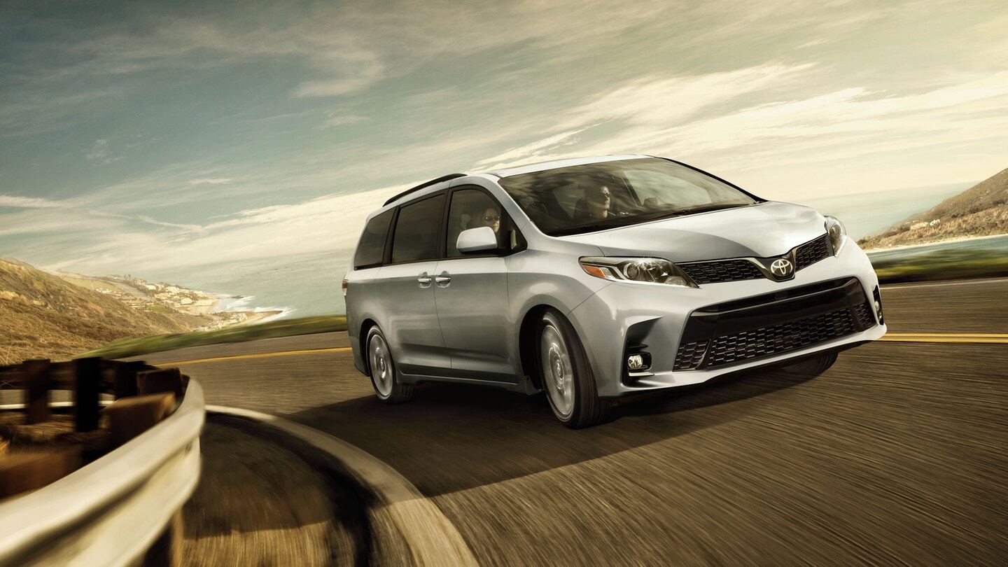 Front exterior view of a gray Toyota Sienna