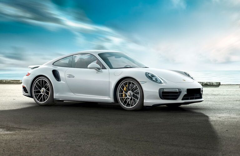 2018 Porsche 911 Turbo S in white with a background of sky