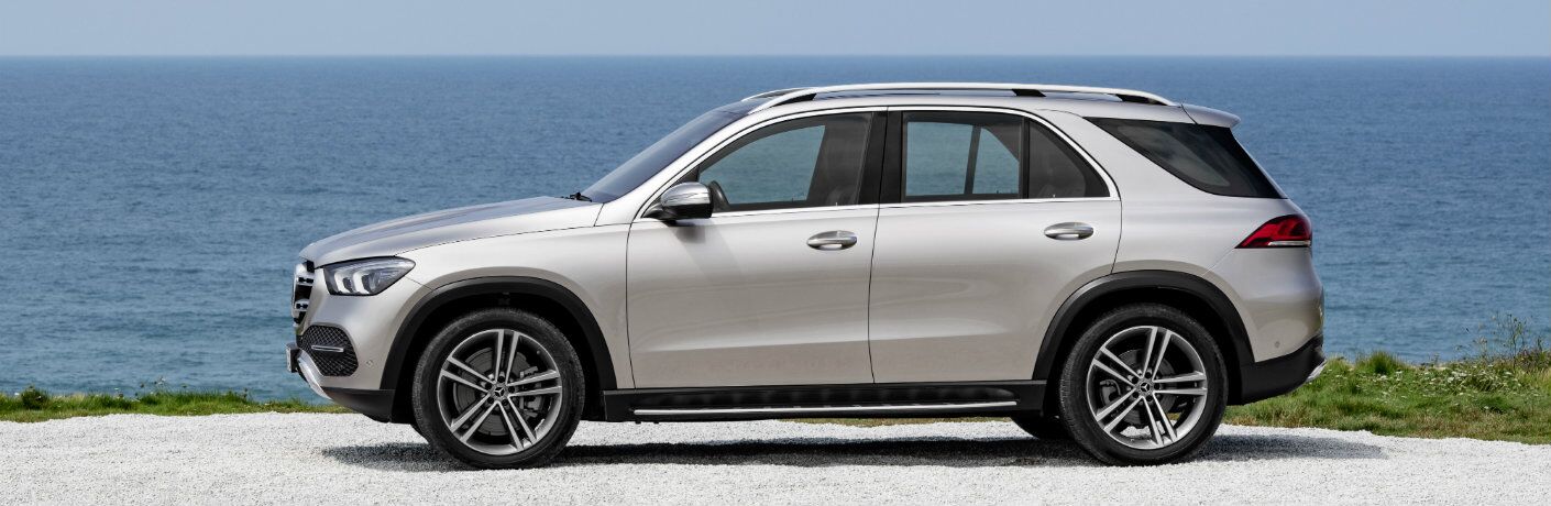 side view of the 2020 Mercedes-Benz GLE in front of water