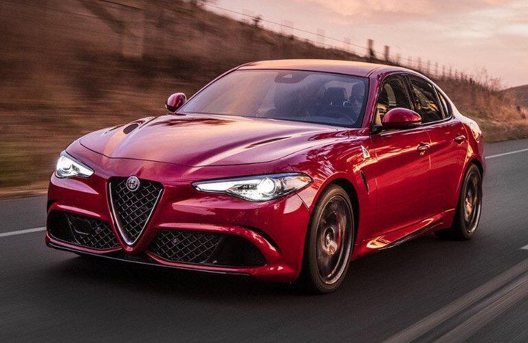 red Alfa Romeo Giulia Quadrifoglio on the road