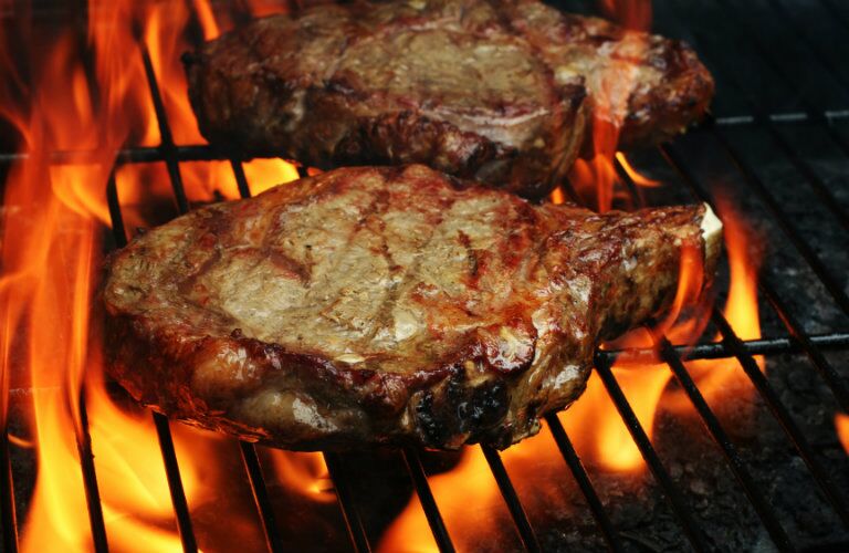 steaks being grilled