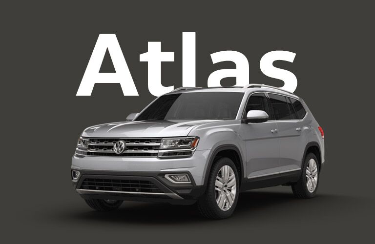 silver Volkswagen Atlas with dark gray background