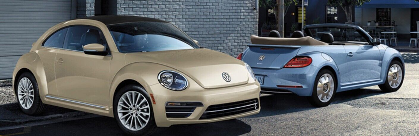 two 2019 Volkswagen Beetle Convertible parked next to each other