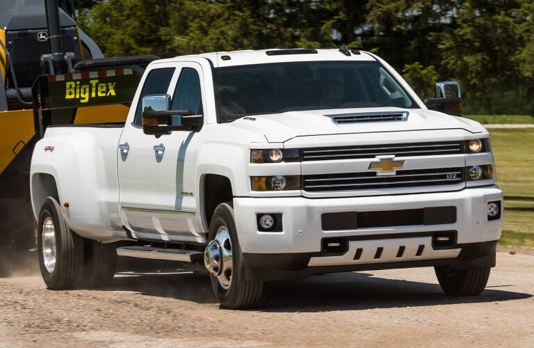 2018 Chevy Silverado 3500HD white front view with trailer