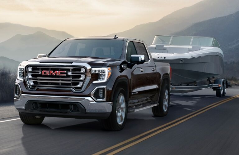 2018 GMC Sierra 1500 towing a boat front view