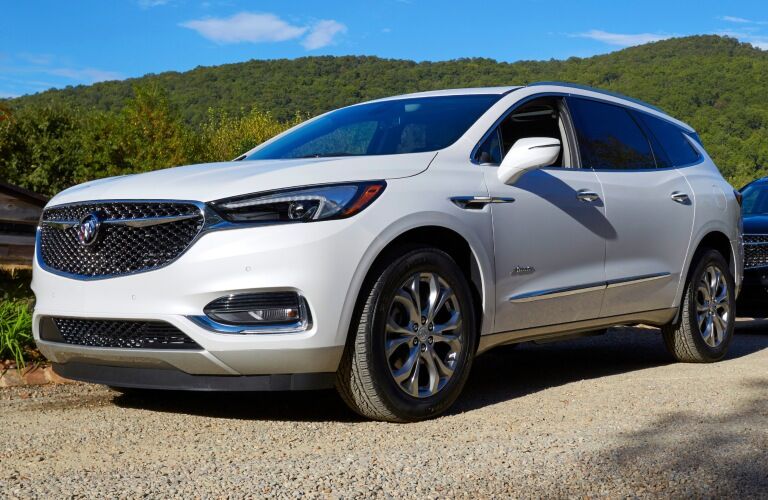 2019 Buick Enclave white side view on gravel