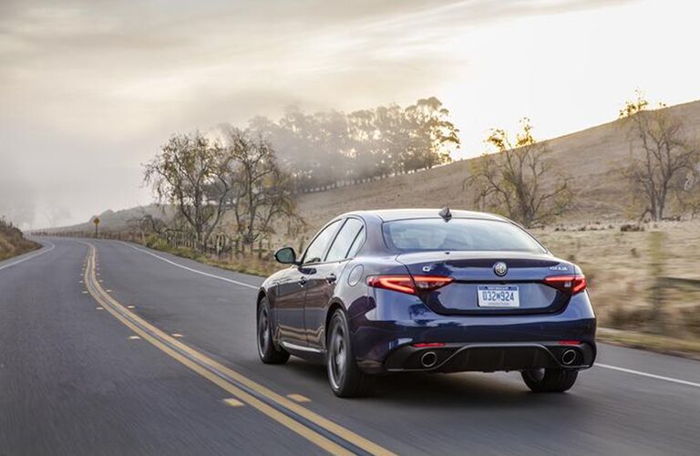 rear and side view of blue 2019 alfa romeo giulia