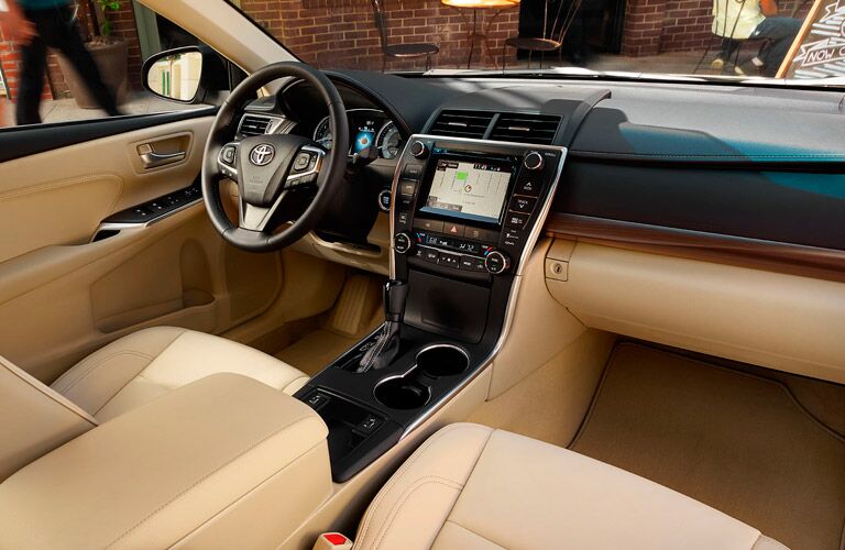 2017 Toyota Camry two tone interior with infotainment center and steering wheel