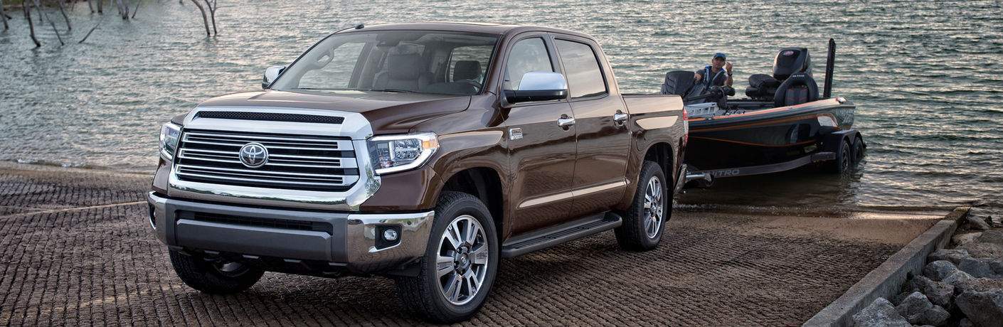 2018 Toyota Tundra Towing a Boat Exterior View in Burgundy