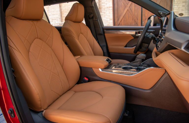 A photo of the front seats in the 2020 Highlander Hybrid.