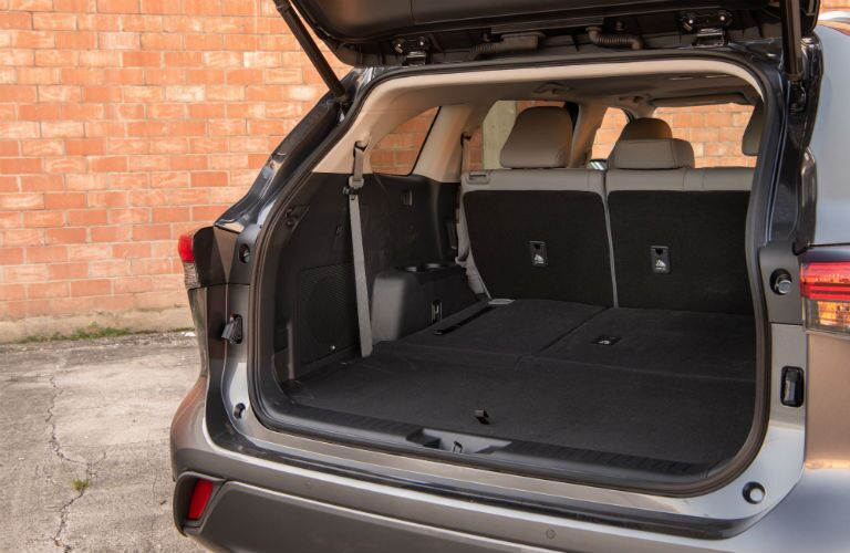 A photo of the cargo area in the rear of the 2020 Toyota Highlander Hybrid.
