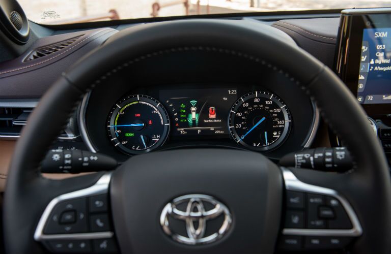 A photo of the center gauge cluster in the 2020 Toyota Highlander Hybrid.