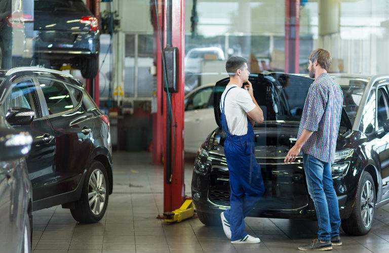 Service Technician Talking to Customer
