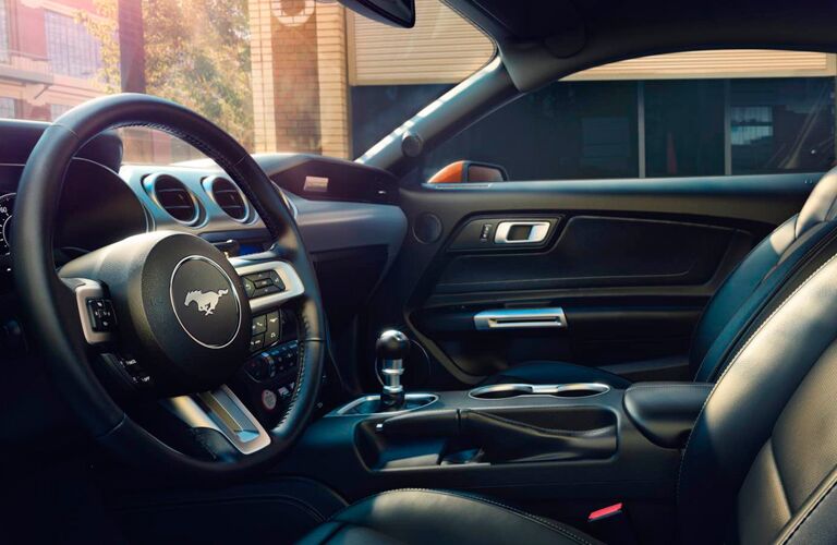View of the 2018 Ford Mustang's steering wheel from the driver's side