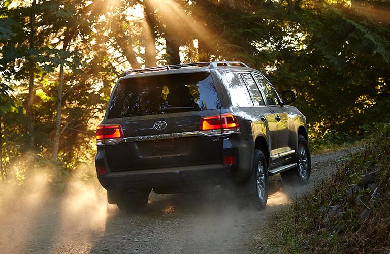 2019 Toyota Land Cruiser driving on a dusty trail